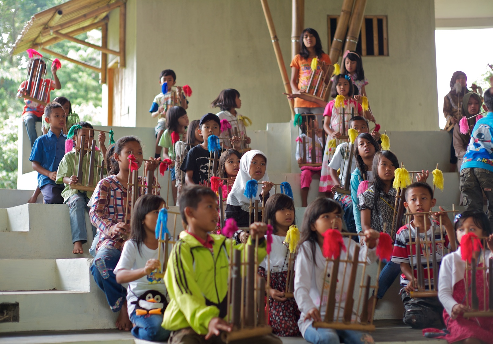 Chidren in the Green Montessori School practicing Angklung