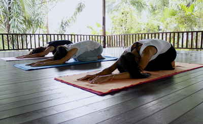 A group doing Yoga